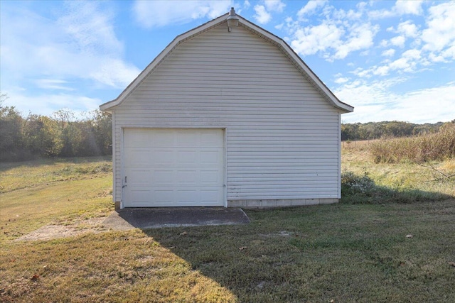 garage with a lawn