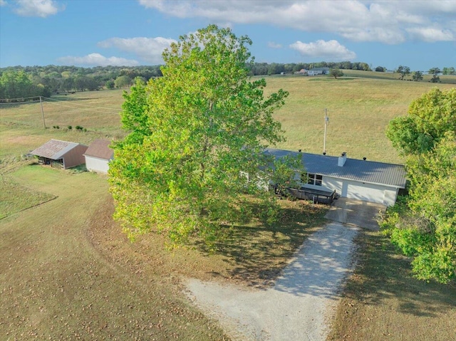 birds eye view of property featuring a rural view