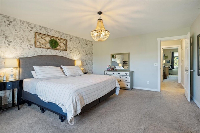 bedroom with a chandelier and carpet