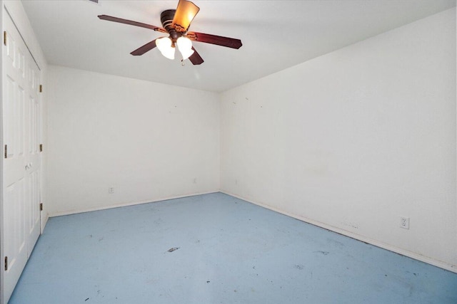 spare room with ceiling fan