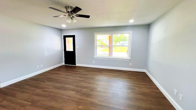 unfurnished room featuring a ceiling fan, baseboards, dark wood-style flooring, and recessed lighting