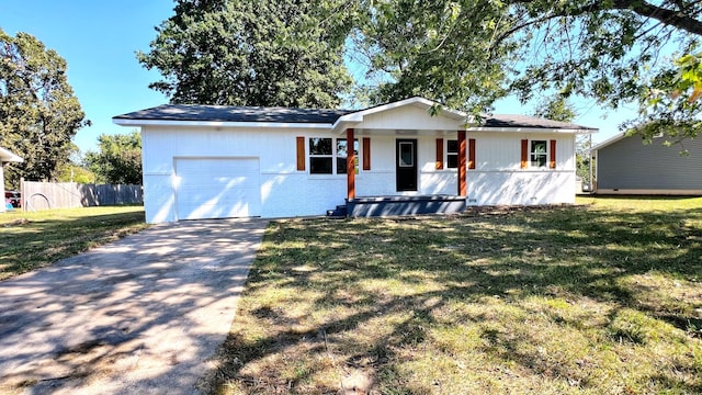 ranch-style home featuring a porch, an attached garage, a front yard, and concrete driveway