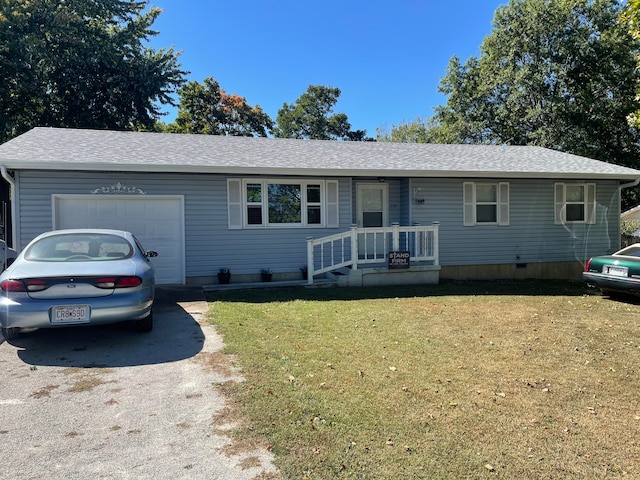 single story home with a garage and a front yard