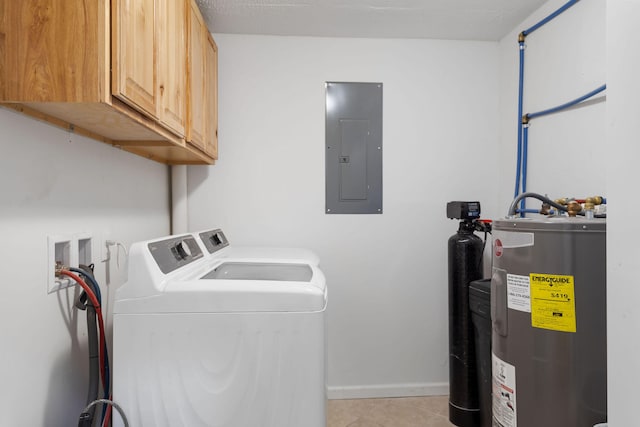 clothes washing area featuring cabinets, electric water heater, washer and clothes dryer, light tile patterned floors, and electric panel