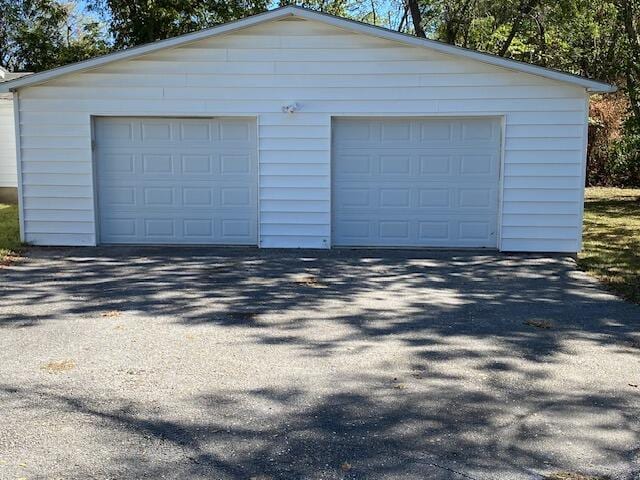 garage with wood walls