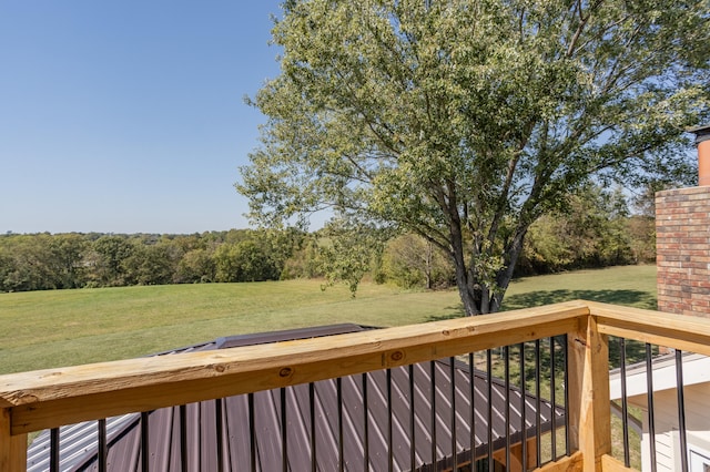 deck featuring a lawn