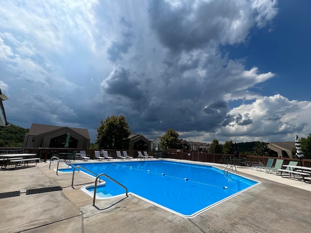 view of pool featuring a patio area