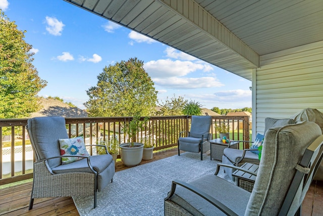 wooden deck with outdoor lounge area