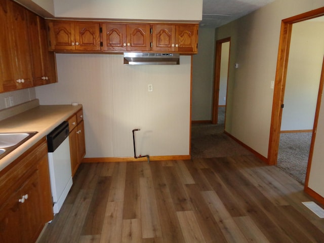 kitchen with dishwasher and hardwood / wood-style floors