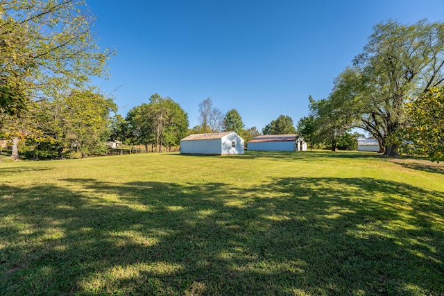 1400 W Oak St, Ozark, MO 65721 - view of yard with an outdoor structure