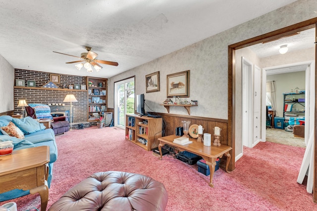 1400 W Oak St, Ozark, MO 65721 - carpeted living room featuring a textured ceiling and ceiling fan