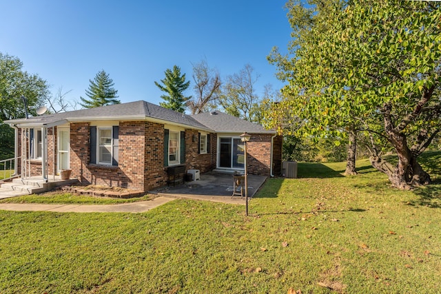 1400 W Oak St, Ozark, MO 65721 - back of property with brick siding, a yard, and a patio