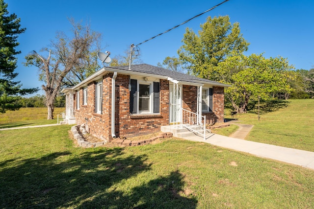 1400 W Oak St, Ozark, MO 65721 - bungalow-style house featuring brick siding and a front yard