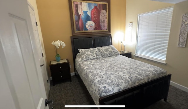 420 Fall Creek Dr Unit 6, Branson, MO 65616 - bedroom with dark colored carpet and baseboards