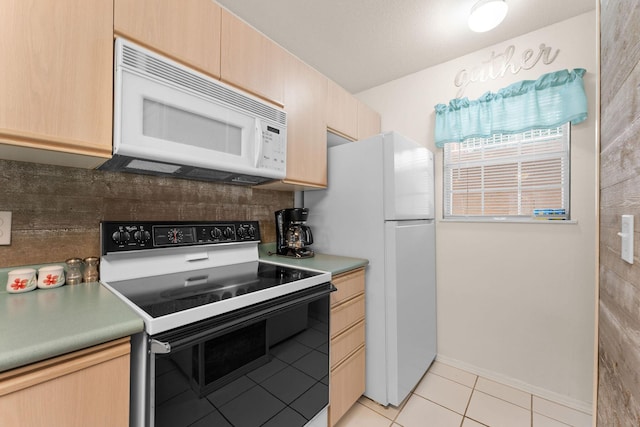 34 Golfshores Dr Unit 8, Branson, MO 65616 - kitchen featuring light brown cabinets, white appliances, light tile patterned floors, backsplash, and baseboards