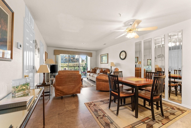 dining room featuring ceiling fan