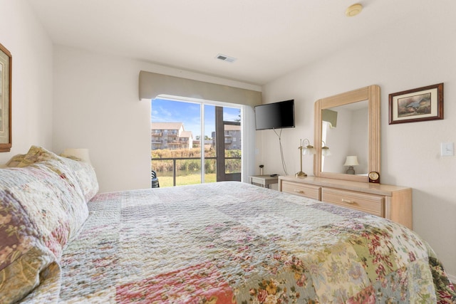 34 Golfshores Dr Unit 8, Branson, MO 65616 - bedroom with visible vents and access to exterior