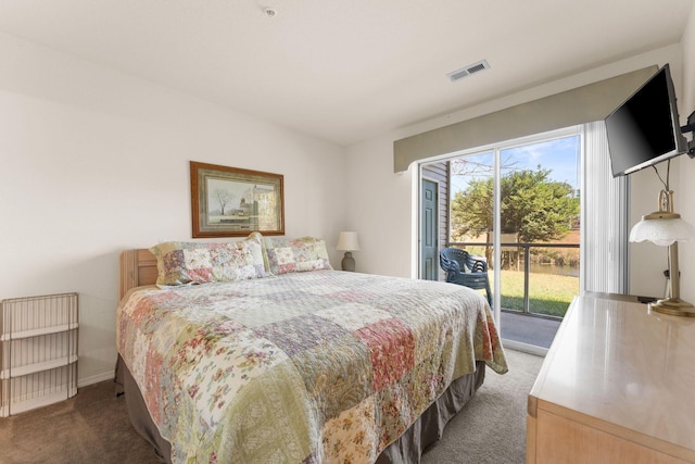 34 Golfshores Dr Unit 8, Branson, MO 65616 - carpeted bedroom with visible vents, baseboards, and access to exterior