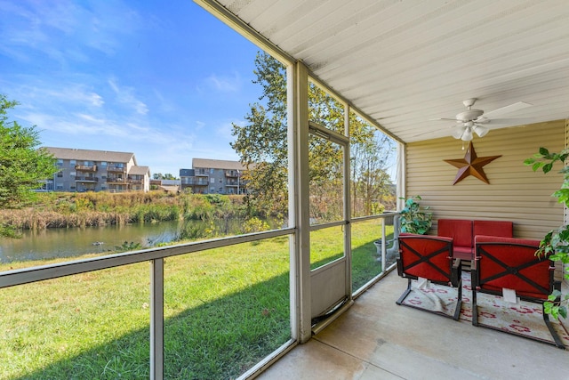 34 Golfshores Dr Unit 8, Branson, MO 65616 - sunroom / solarium featuring a wealth of natural light, a water view, and ceiling fan