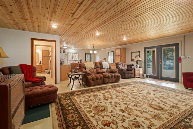 living area with wooden ceiling, french doors, and recessed lighting