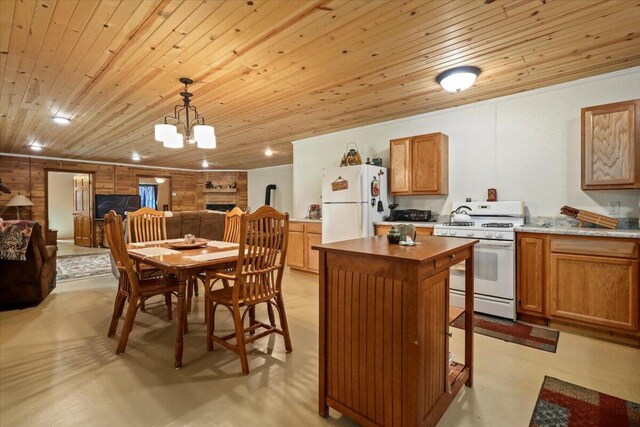 kitchen with wooden counters, open floor plan, a chandelier, white appliances, and wooden ceiling