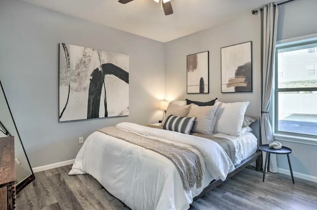 bedroom featuring ceiling fan and hardwood / wood-style flooring