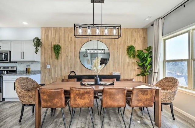 dining room with light wood-type flooring