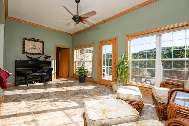 sunroom / solarium with ceiling fan