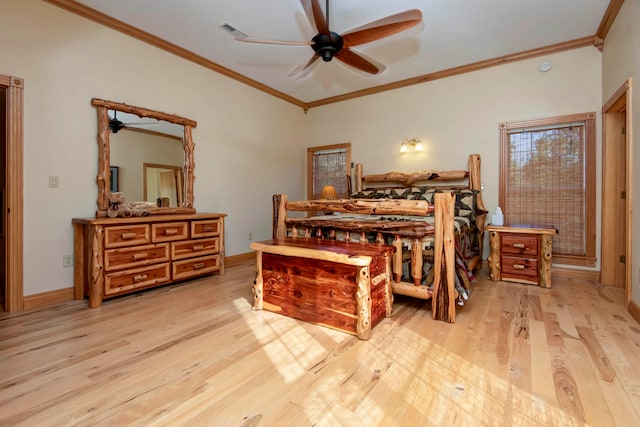 bedroom with crown molding, ceiling fan, and light hardwood / wood-style flooring