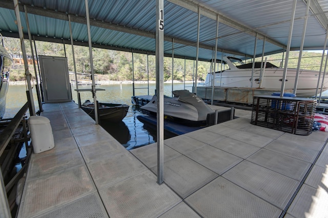 view of dock with a water view