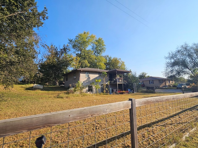 view of front of home with a front lawn