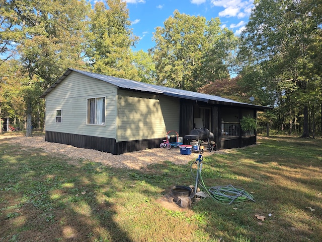 view of home's exterior featuring a yard