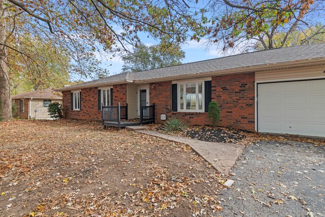 ranch-style home with a garage