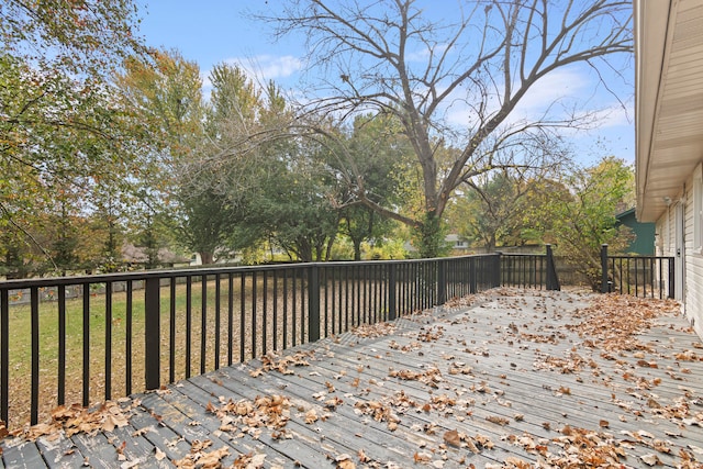 wooden terrace with a yard