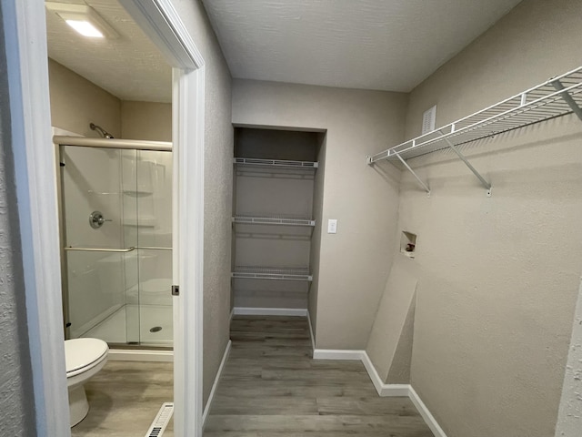 824 W Elm St, Springfield, MO 65806 - walk in closet with wood finished floors