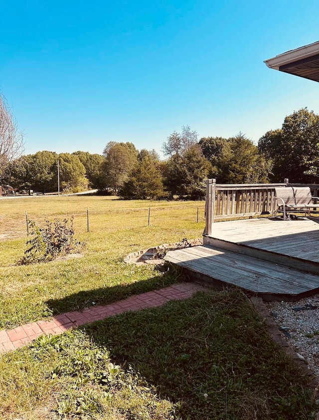 view of yard with a wooden deck