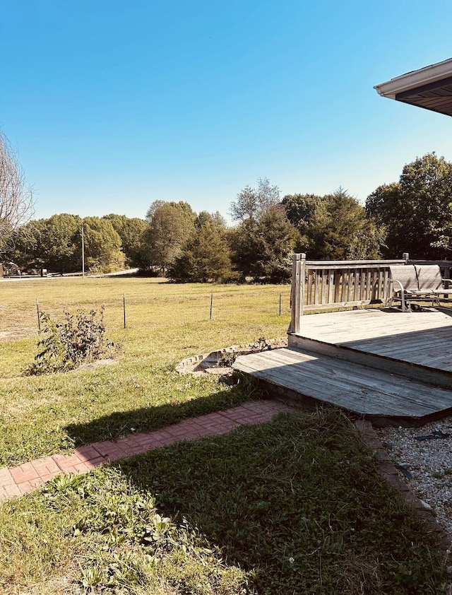 view of yard with a deck