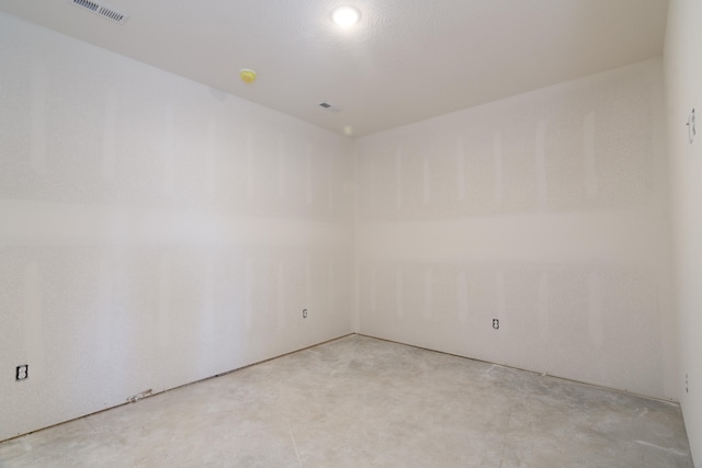 empty room featuring concrete floors