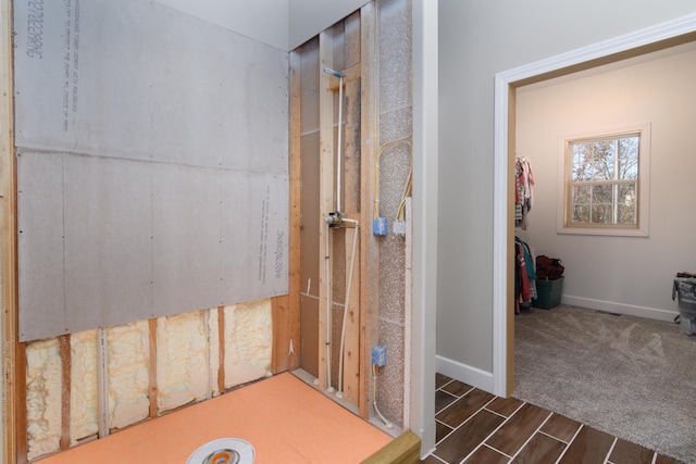 bathroom featuring wood-type flooring