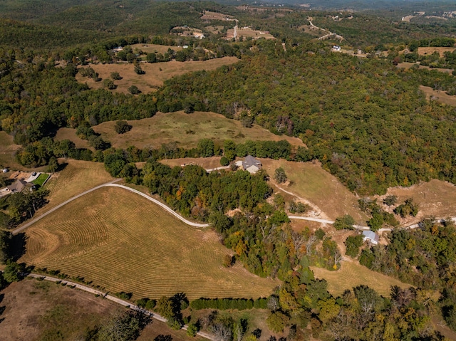 birds eye view of property featuring a rural view