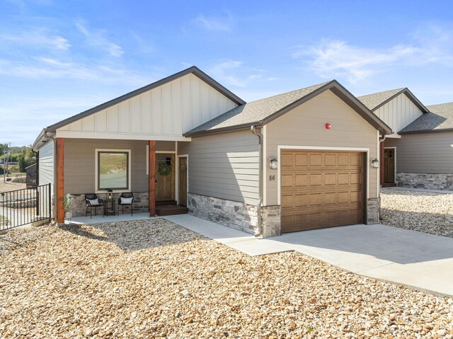 view of front of property with a garage