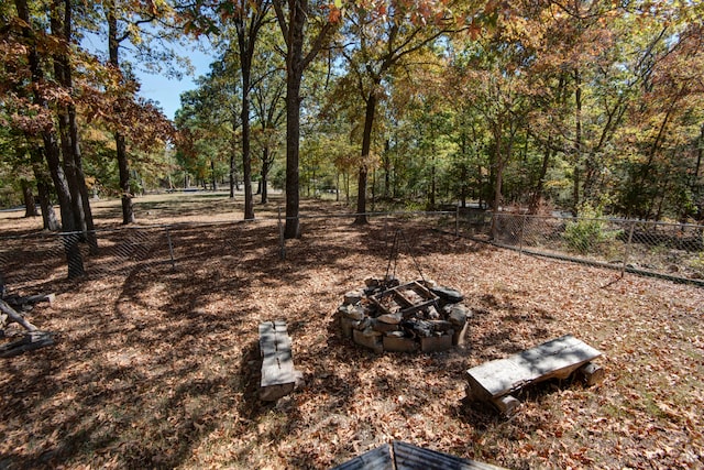 view of yard featuring a fire pit