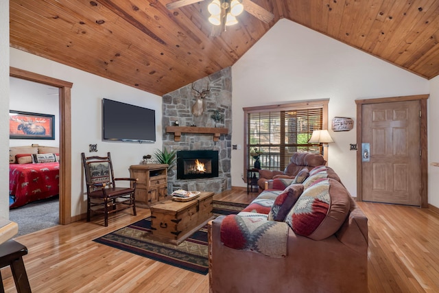 living room featuring a fireplace, wood ceiling, high vaulted ceiling, and hardwood / wood-style flooring