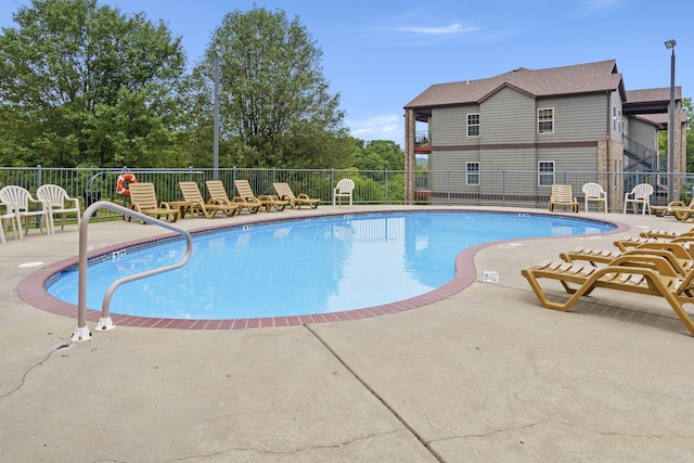 view of pool featuring a patio area