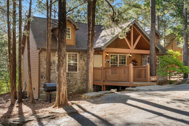 view of front of home featuring a wooden deck