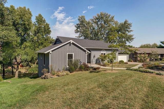 single story home with a garage and a front lawn