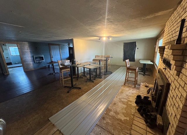 interior space with wood-type flooring and heating unit