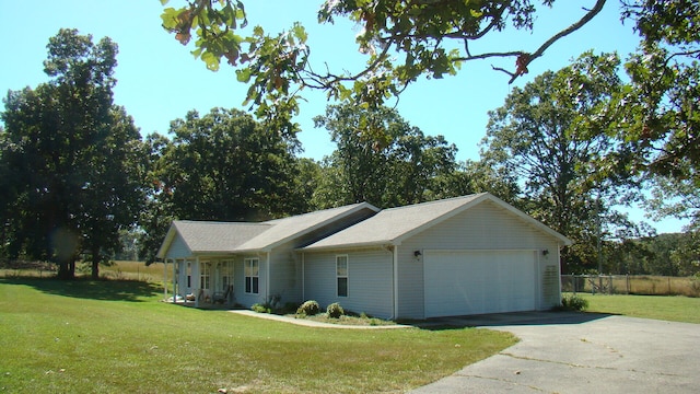 view of property exterior featuring a yard and a garage