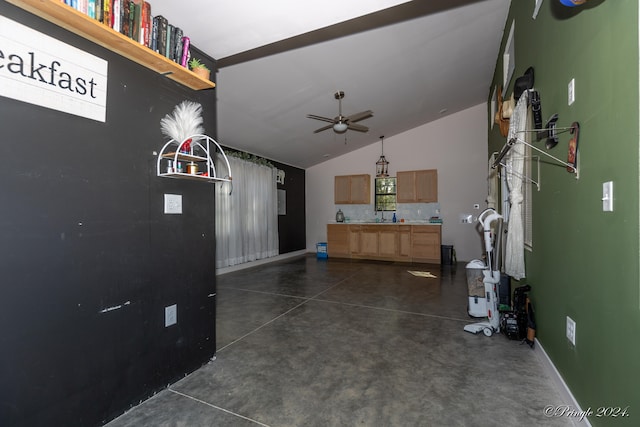 interior space featuring lofted ceiling and ceiling fan