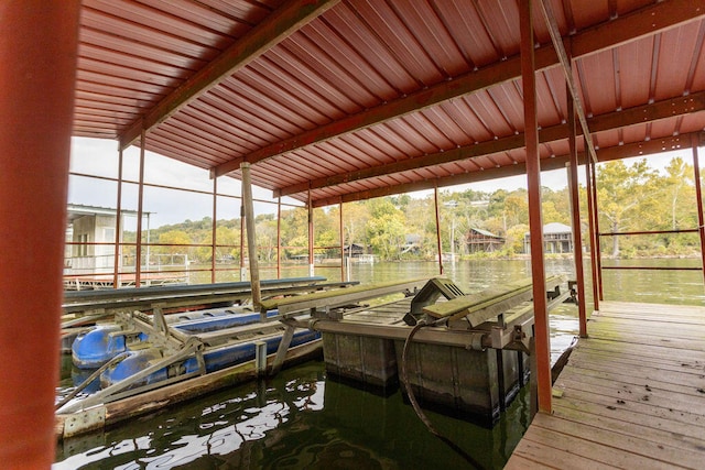 dock area featuring a water view